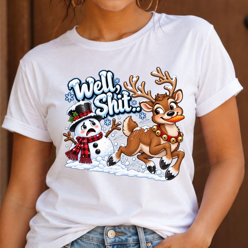 May include: A white t-shirt featuring a graphic print of a distressed snowman wearing a black top hat and a red and black plaid scarf, alongside a brown reindeer with a bell collar holding a carrot, with the text Well, Shit above them.