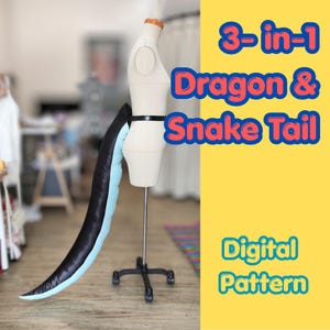 May include: A long, curved tail with a black top and light blue underside attached to a beige dress form. The text on the right side reads 3-in-1 Dragon & Snake Tail Digital Pattern in blue letters with a red outline on a yellow background.