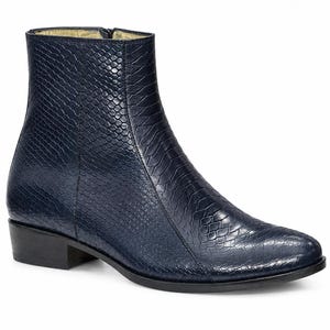 Side profile of luxury men's dress boots in embossed cow-hide leather