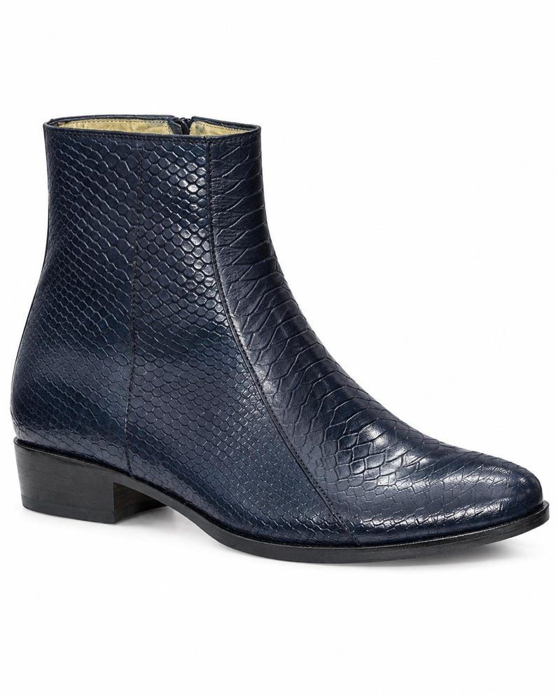Side profile of luxury men's dress boots in embossed cow-hide leather