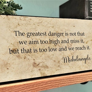 Michelangelo-The Greatest Danger is Not That We Aim Too High and Miss It but That Is Too Low and We Reach It- Wall Decor, Wall Hanging