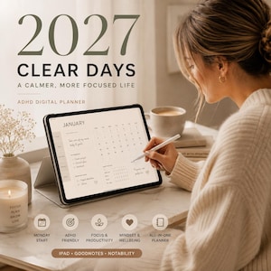 May include: A digital planner displayed on a tablet screen showing a January calendar layout with the text 2027 CLEAR DAYS A CALMER, MORE FOCUSED LIFE ADHD DIGITAL PLANNER. The interface includes sections for goals, tasks, and habit tracking.