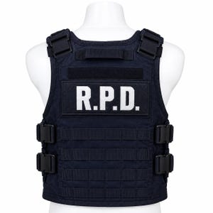 May include: A dark navy blue tactical vest featuring the white text R.P.D. on a rectangular patch across the chest. The vest includes adjustable shoulder straps, side buckles, and horizontal webbing rows for modular attachments on the front panel.