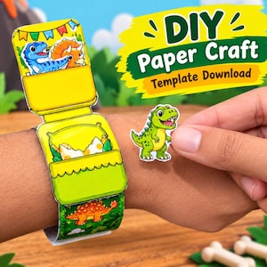 May include: A paper craft wristband featuring colourful dinosaur illustrations, including a blue T-Rex and an orange triceratops. The band has a yellow pocket section and a green base. Text reads DIY Paper Craft Template Download.