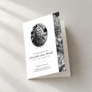 May include: A folded funeral program featuring a black and white portrait of Elizabeth Anne Brooks in an oval frame. The text reads In Loving Memory of Elizabeth Anne Brooks, March 14, 1942 - November 8, 2024, and Funeral Service details.