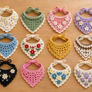 May include: A collection of twelve triangular crochet pet bandanas arranged in a grid. Each bandana features unique color combinations, including cream, green, pink, purple, blue, yellow, brown, and black, with various floral motifs and scalloped edges.