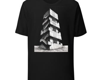 May include: A black short-sleeve t-shirt featuring a centered graphic illustration of a tall, multi-tiered concrete structure. The building design displays sharp geometric angles, visible staircases, and vertical lines in shades of gray and white.
