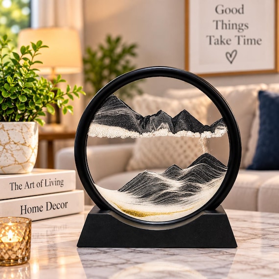 A round glass liquid sandscape that creates mesmerizing slow-motion seascape scenes every time you flip it — genuinely hypnotic desk art.