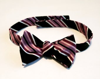 Purple striped silk bow tie.