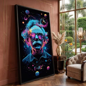 May include: A framed wall art print featuring a stylized portrait of a man with a mustache and messy hair wearing sunglasses that reflect a galaxy. The background is black with colorful planets and the text E=MC² in neon colors.