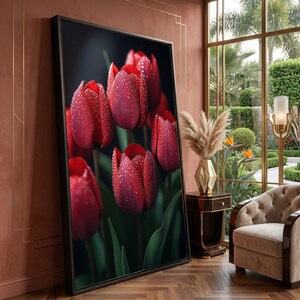 May include: A large rectangular framed wall art piece featuring a close-up of several vibrant red tulips covered in small water droplets. The flowers are set against a dark, moody background, highlighting the deep red petals and green stems.