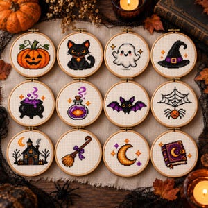 May include: Twelve circular wooden embroidery hoops containing cross-stitch patterns featuring Halloween motifs: a pumpkin, black cat, ghost, witch hat, cauldron, potion bottle, bat, spider on a web, haunted house, broomstick, crescent moon, and spellbook.