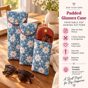 May include: Three padded glasses cases in varying heights, featuring a blue fabric with a white daisy print, orange interior lining, and a gold magnetic snap closure. Text on the right reads: SEW YOUR OWN Padded Glasses Case PRINTABLE PDF SEWING PATTERN.