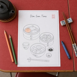 May include: A white coloring page titled Dim Sum Time featuring line art of bamboo steamers with dumplings, a bowl of wontons, and small dipping bowls. One dumpling is colored light pink. The page includes a red stamp with Chinese characters.