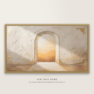 May include: A rectangular wall art print in a gold frame featuring a textured off-white wall with a central arched opening revealing a warm golden light. The text AIM TRUE HOME an instant digital download for the frame tv appears below the image.