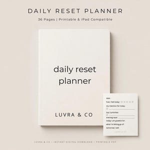 May include: A daily reset planner with 36 pages, printable and iPad compatible. The cover is off-white with black text reading daily reset planner and LUVRA & CO. A smaller matching card shows fields for date, priorities, and gratitude.