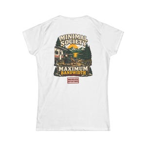 May include: A white t-shirt featuring a graphic on the back of a person sitting in a chair by a camper, lake, and mountains. The text reads MINIMAL SOCIETY, MAXIMUM BANDWIDTH, and UNCIVILIZED INTENTIONS. The design includes pine trees and a sun.