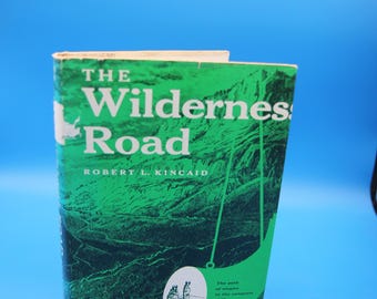 Edición clásica de The Wilderness Road de Robert L. Kincaid, tapa dura con sobrecubierta (1966).