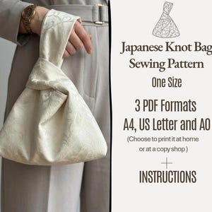 May include: A cream-colored Japanese knot bag with a subtle tonal floral pattern. The text reads: Japanese Knot Bag Sewing Pattern, One Size, 3 PDF Formats A4, US Letter and A0, Choose to print it at home or at a copy shop, INSTRUCTIONS.