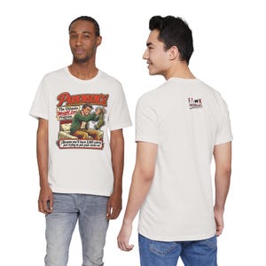 May include: A white t-shirt featuring a graphic illustration of a person sitting on a bed struggling to put on a sock. The text reads: Parkinson's! The Ultimate Weight Loss Program. (Because you'll burn 3,000 calories just trying to put your socks on).