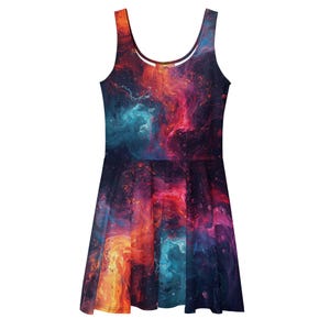 May include: A sleeveless skater dress featuring a vibrant galaxy print with swirling clouds of deep purple, bright magenta, fiery orange, and electric blue colors against a dark background, complete with a scoop neckline and flared skirt.