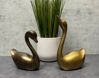 Two Brass Swans