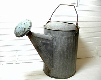 Rusty watering can Etsy