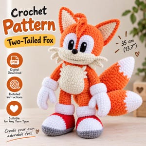 May include: A crochet pattern for a two-tailed fox, featuring a 13.7-inch tall orange and white stuffed toy with large ears, white gloves, and red and white shoes. The digital download includes detailed instructions for any yarn type.