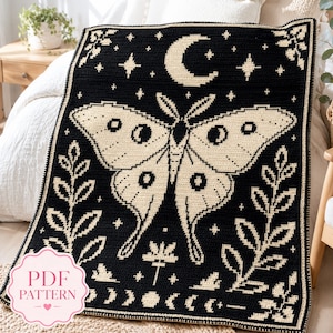 May include: A black and cream crochet blanket featuring a large central moth, a crescent moon, stars, and leafy branches. The bottom border displays a lunar cycle phase pattern. A pink label in the corner reads PDF PATTERN with a small heart icon.