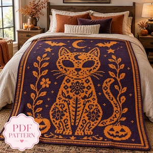 May include: A rectangular crochet blanket featuring a dark purple background with an orange pattern of a central cat, crescent moon, stars, bats, floral vines, and jack-o'-lanterns. The design includes a decorative border and a PDF pattern label.