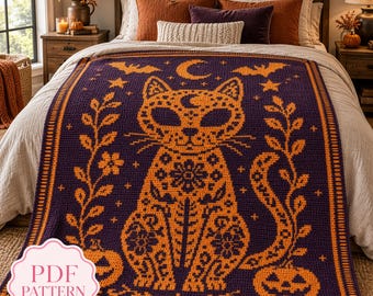 May include: A rectangular crochet blanket featuring a dark purple background with an orange pattern of a central cat, crescent moon, stars, bats, floral vines, and jack-o'-lanterns. The design includes a decorative border and a PDF pattern label.