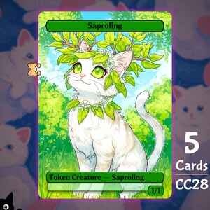 May include: A rectangular trading card featuring a white cat with green eyes, wearing a crown of green leaves and white flowers. The card is labeled Saproling at the top and Token Creature - Saproling at the bottom, with the number 1/1 in the corner.