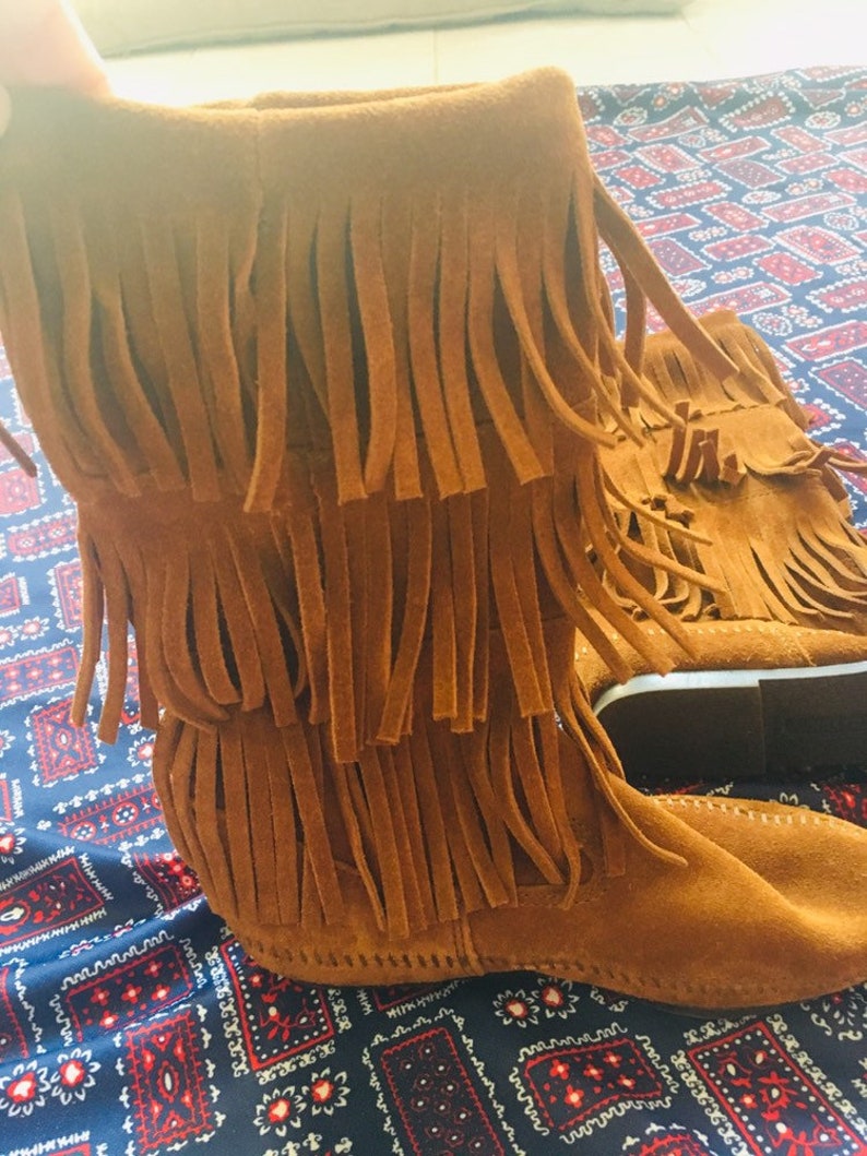 Minnetonka 6.57 fringe boots