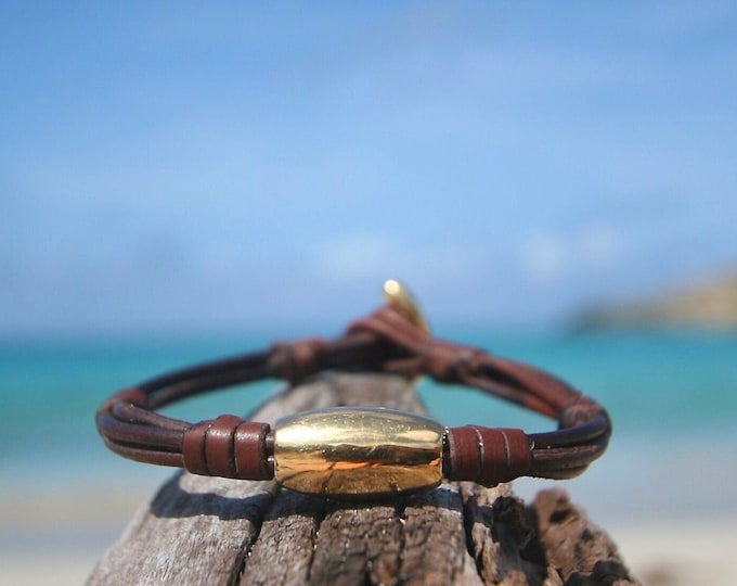 Unisex bracelet featuring gold and leather from St Barth, seaside Bohemian chic jewelry, St Barth jewelry signature, gold & leather designr