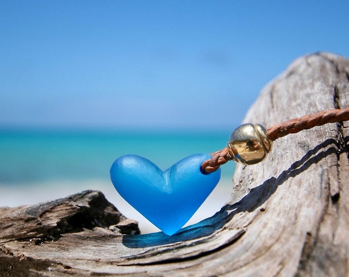 Heart sea-glass pendant leather necklace with 18k gold pearl strung on leather and a Tahitian pearls as clasp. St Barth jewelry island