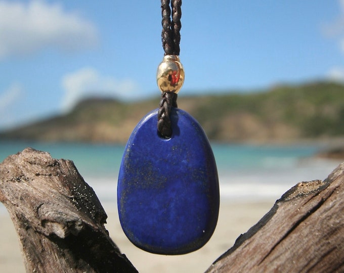 Lapis lazuli pendant necklace and 18k gold pearl mounted on leather with Tahitian pearl clasp, hand carved, beach jewelry from St Barthelemy