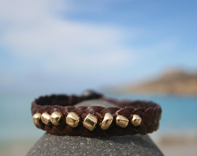 Unisex leather bracelet featuring solid 18k gold beads and a Tahitian black pearl clasp, bohemian-chic inspiration, St Barth, beach jewelry