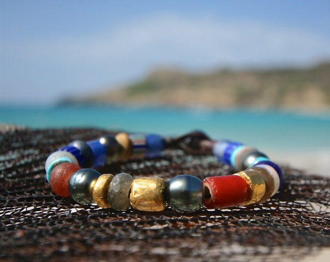 24k pure gold beads strung on leather with Tahitian black pearls and ancient African trading beads. Cultured black pearls, jewelry St Barth