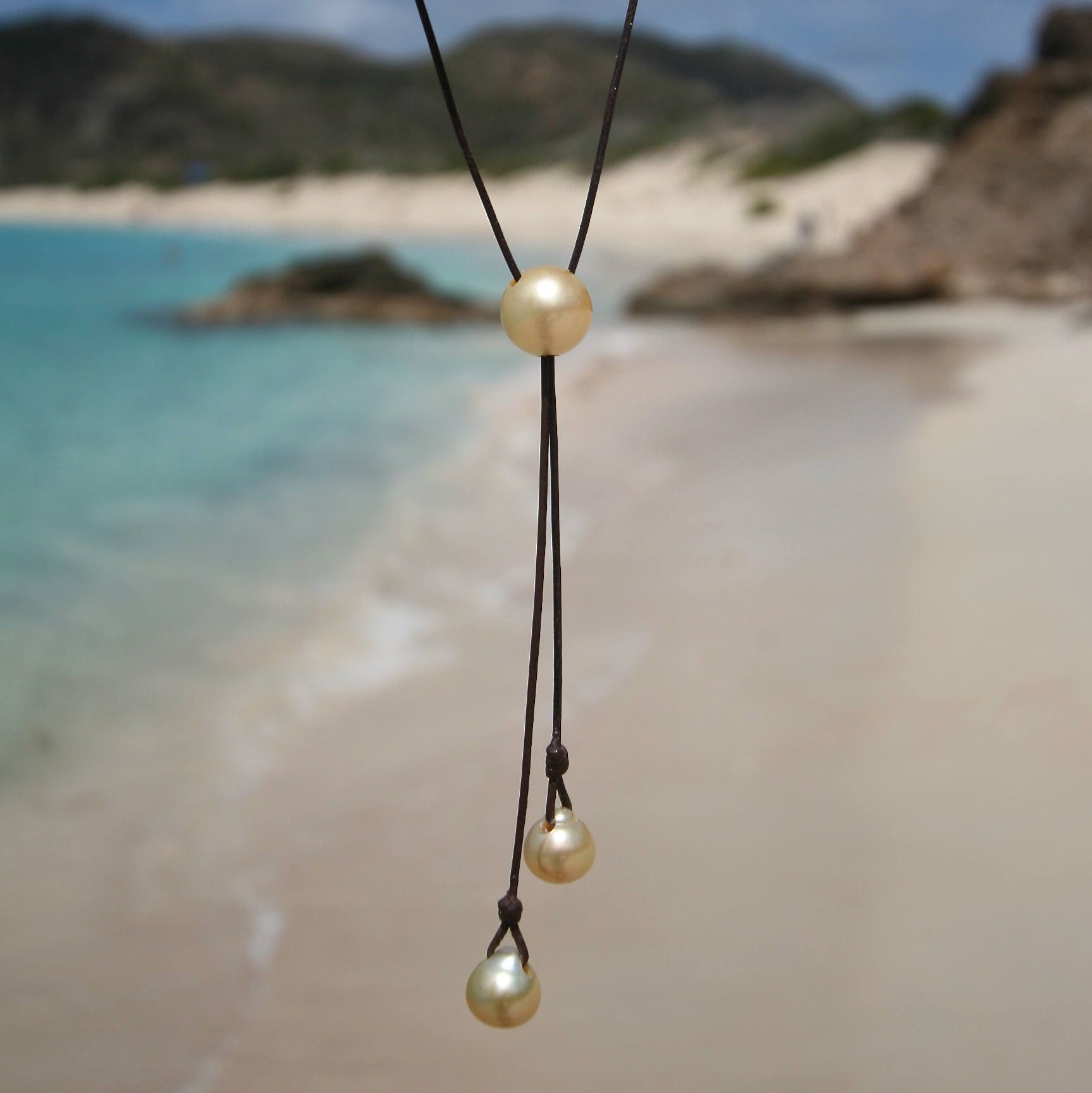 Fine gold Australian pearl lariat necklace on leather gold