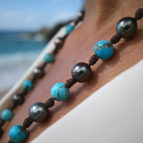 Long Opera necklace featuring Black Tahitian pearls and Genuine Turquoise from Nevada strung on hand rolled leather. St Barth, Seaside, love