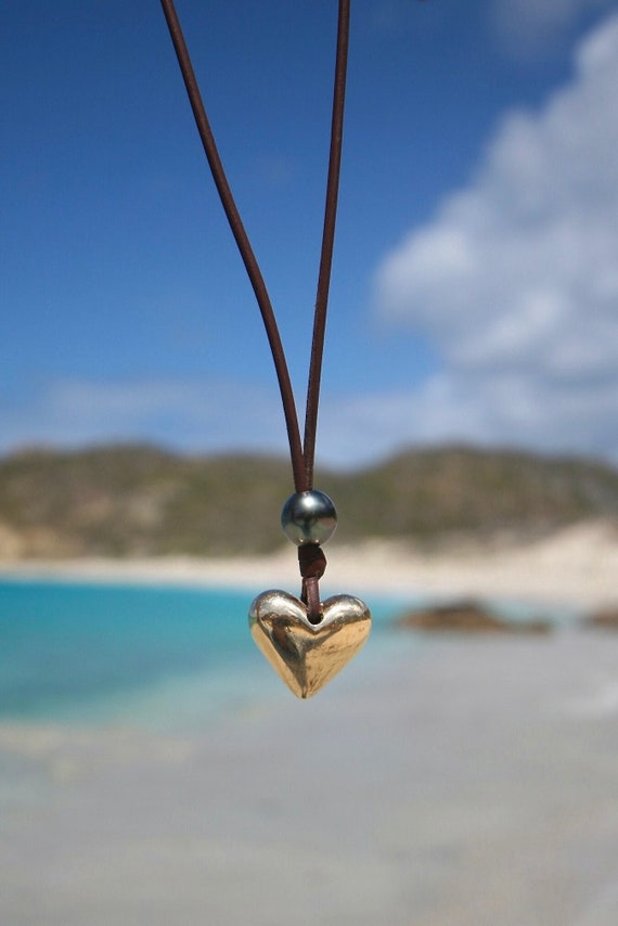 Medium size heart focal pendant necklace made of 18K gold & Tahitian pearls mounted on leather, beach jewelry, St Barth leather jewelry