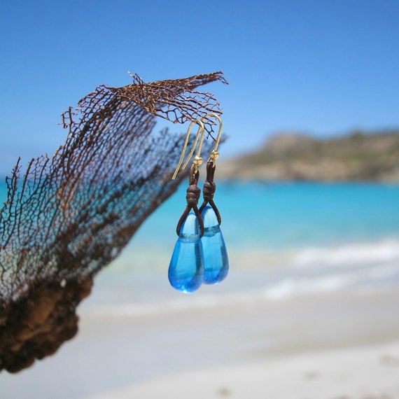 Hand cut glass earrings with 18k gold wires, dangle drops strung on leather, gold pendant, drops on leather, St Barthelemy jewelry