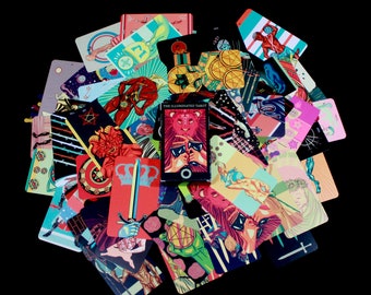 May include: A colourful deck of tarot cards featuring illustrations of various figures and symbols. The cards are arranged in a circular pattern with the title "The Illuminated Tarot" visible on one card.