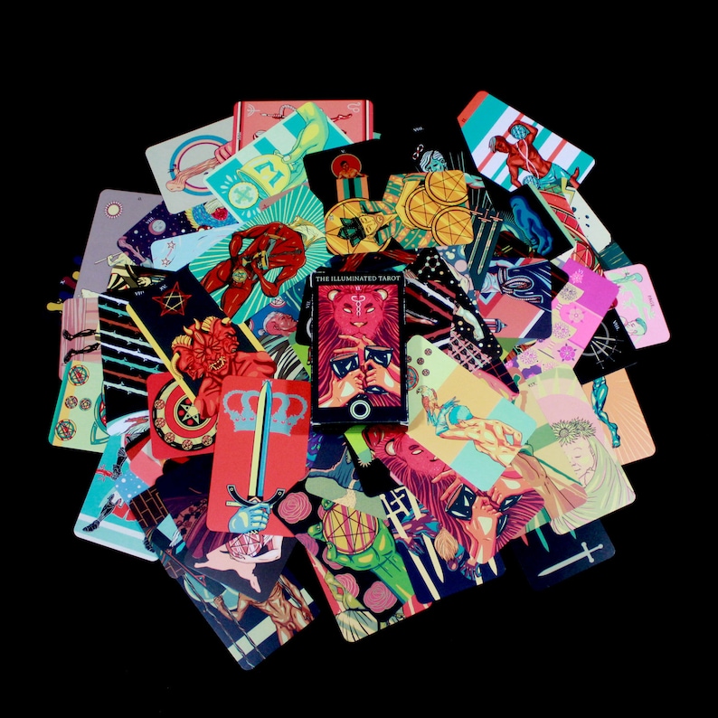 May include: A colorful deck of tarot cards with illustrations of various figures and symbols. The cards are arranged in a circular pattern with the title "The Illuminated Tarot" visible on one card.
