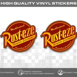 May include: Two circular vinyl stickers featuring a red and yellow logo with the text Medicated Rust-eze Bumper Ointment Rear End Formula. The design includes a stylized yellow font on a red background with a dark border, presented as high quality.