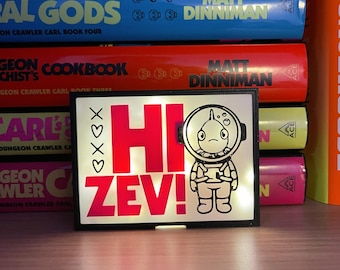 Hi Zev! Dungeon Crawler Carl Inspired Book Nook – Light-Up Shelf Decor (Physical Item)