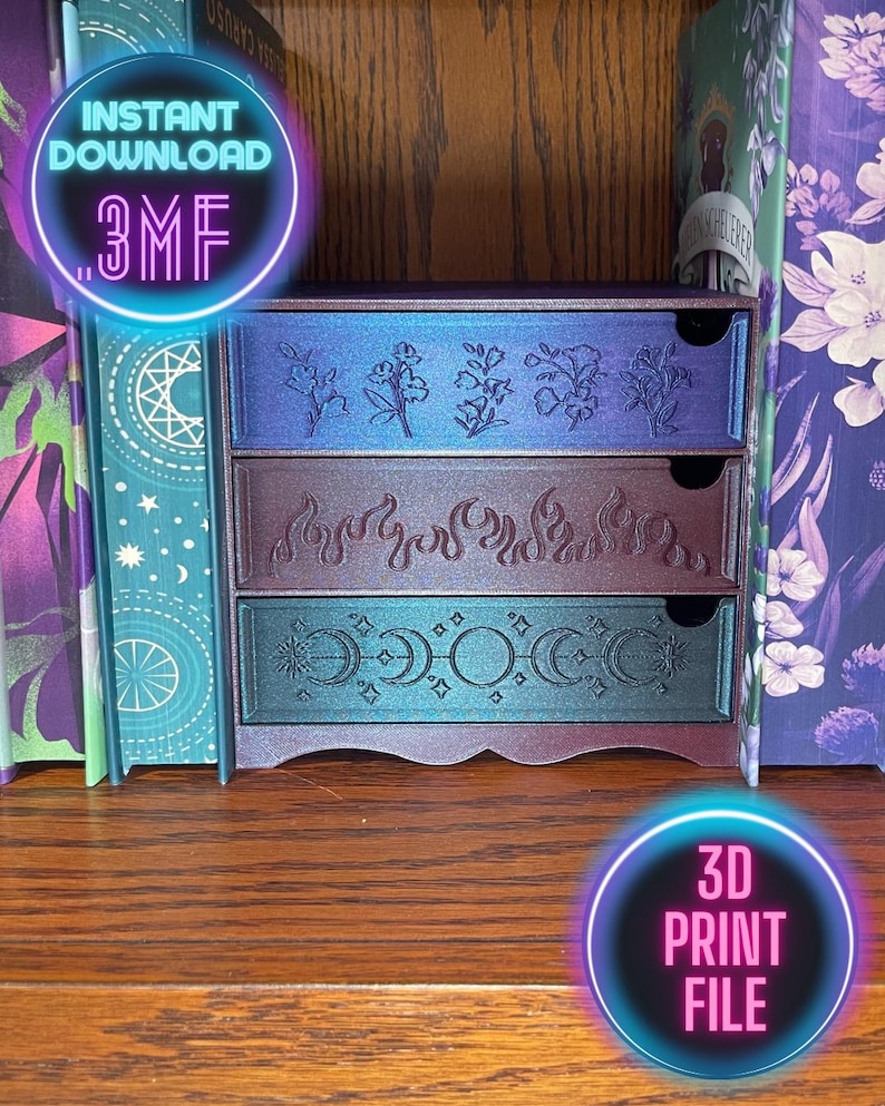 May include: A three-drawer decorative storage box with floral, flame, and celestial designs. The box is in shades of blue, purple, and teal. The text "INSTANT DOWNLOAD .3MF" and "3D PRINT FILE" are visible.
