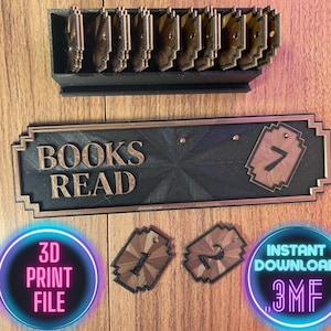 以下が含まれることがあります： 本型のタグ用のホルダーが付いた、黒と金の3Dプリントの「Books Read」サイン。サインには「BOOKS READ」の文字があり、1、2、7と番号が付けられたタグが含まれています。画像には「3D PRINT FILE」の文字も含まれています。