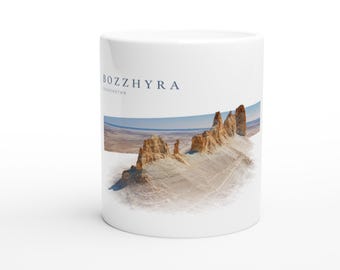 White ceramic mug with the motif "Bozzhyra Tract in Mangystau - Kazakhstan"
