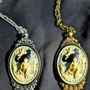 Gothic/victorian ornante 30x40 Cameo necklace. Woman with cherub cameo.You choose metal color antiqued bronze or silver.